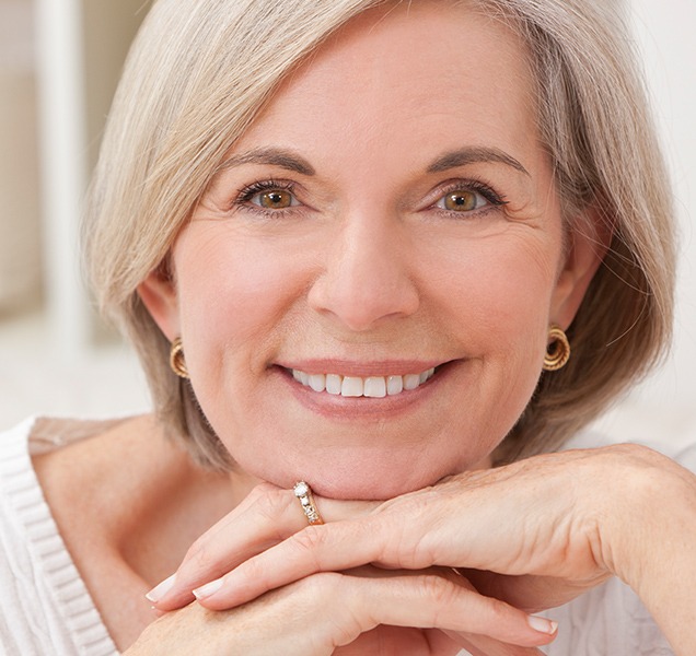 Benefits of a dental implant crowns | Harmony Family Dental Care | Springbank General and Family Dentist